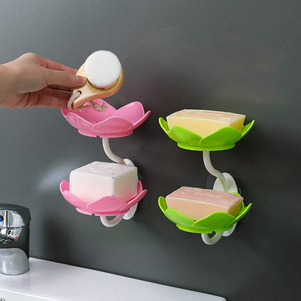 Flower-shaped self-draining soap dish holder for bathroom or kitchen use.