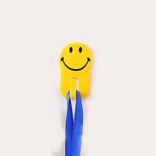 Self-adhesive smiley hooks