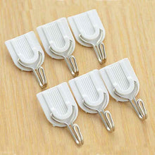 Self-adhesive plastic hook for towels.